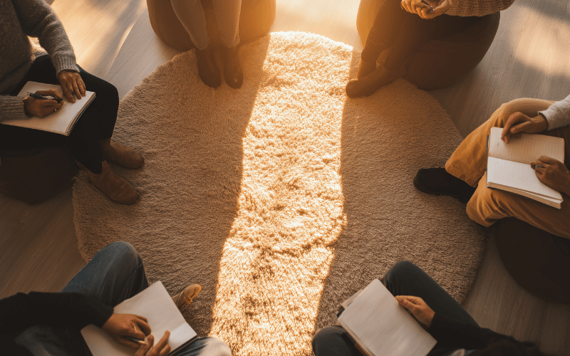 Group therapy session during PHP addiction treatment.