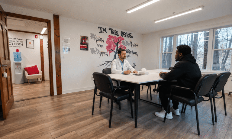 Clinician conducting an intake conversation with a new client